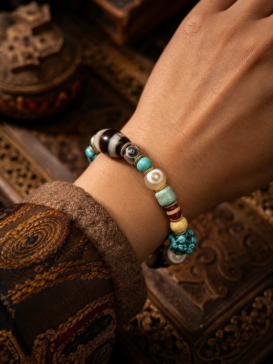 Tibetan Multi-Treasure Agate Dzi Bracelet — wearing view