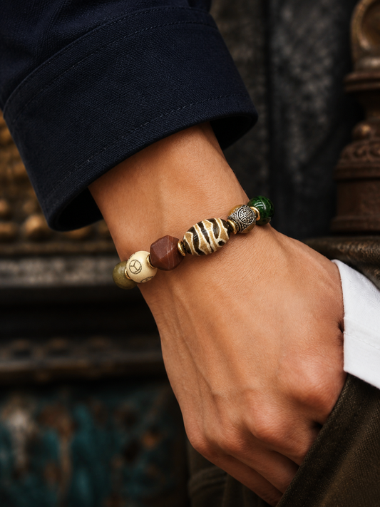 Tibetan Yak Bone Multigem Mala Bracelet with Six-Syllable Motif — worn on wrist