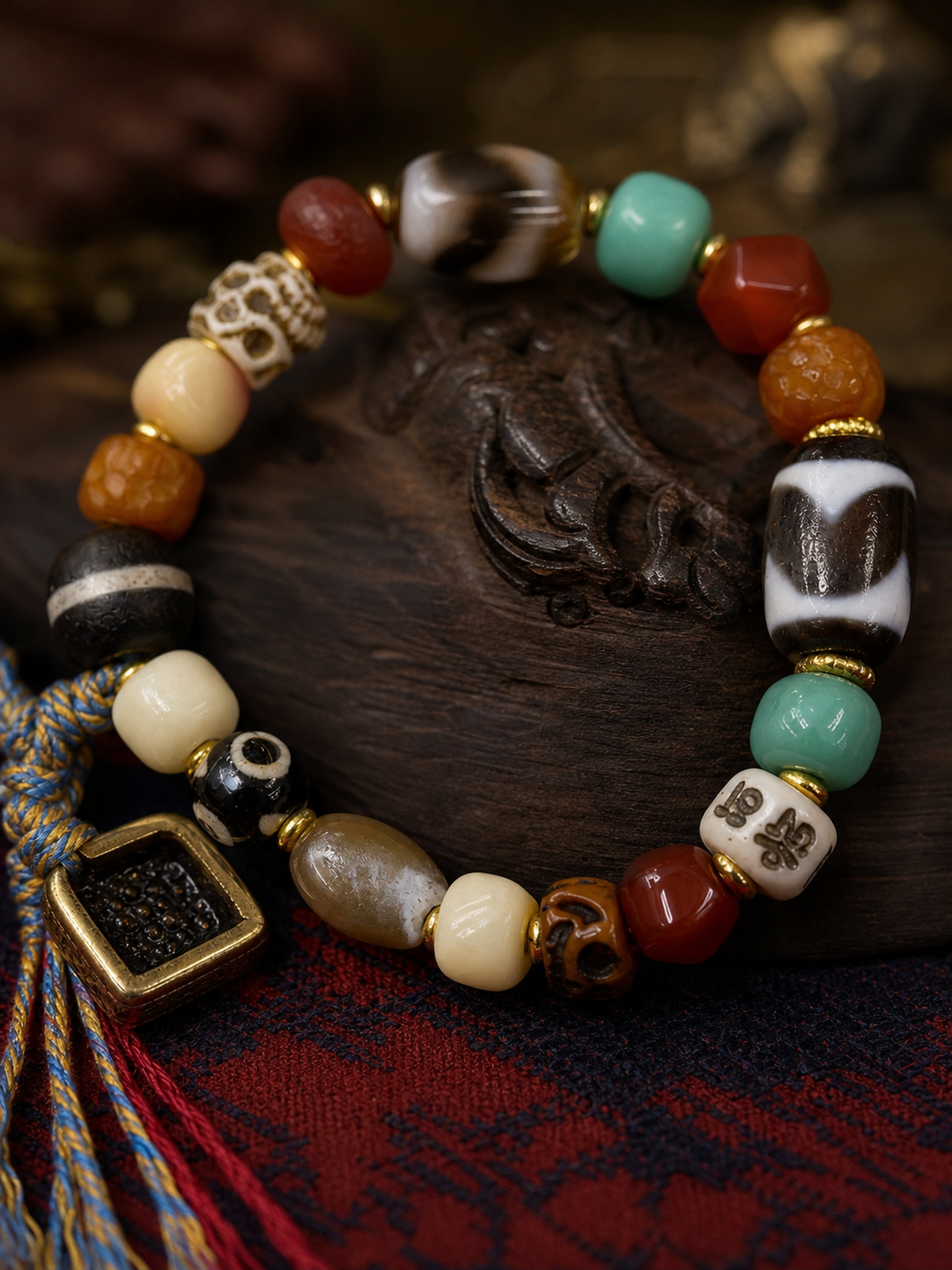 Tibetan Multigem Mala Bracelet with Yellow Jambhala Gau Charm — detail view