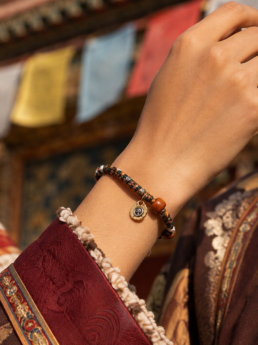Tserra handwoven adjustable Tibetan cord bracelet worn on wrist