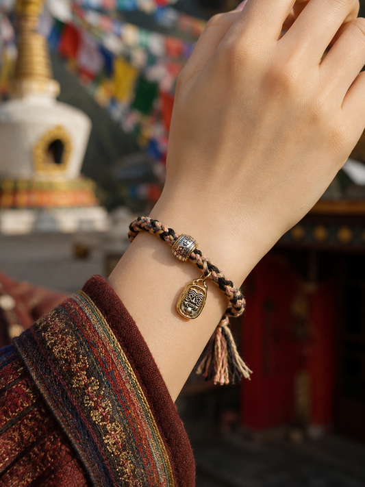 Rose Tibetan thangka-inspired prosperity woven bracelet worn on wrist