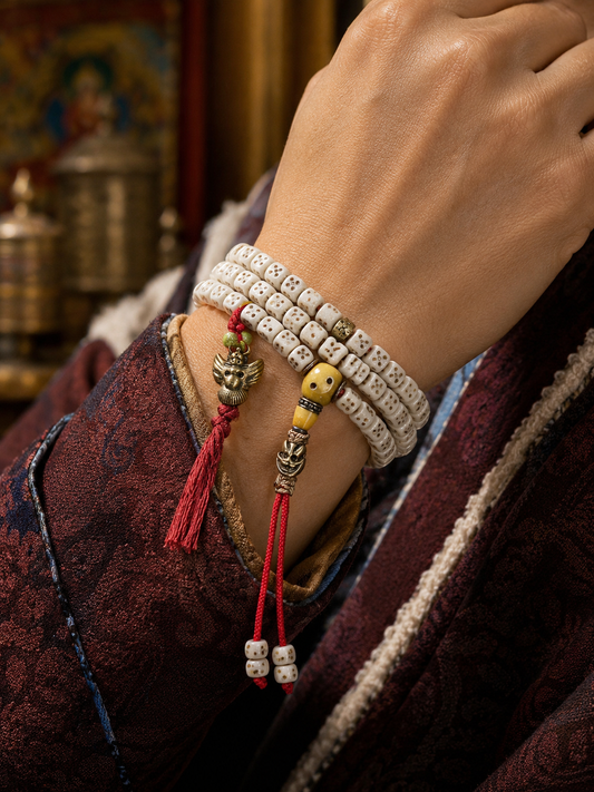 Tibetan carved dice-bead 108-bead mala wrapped on wrist