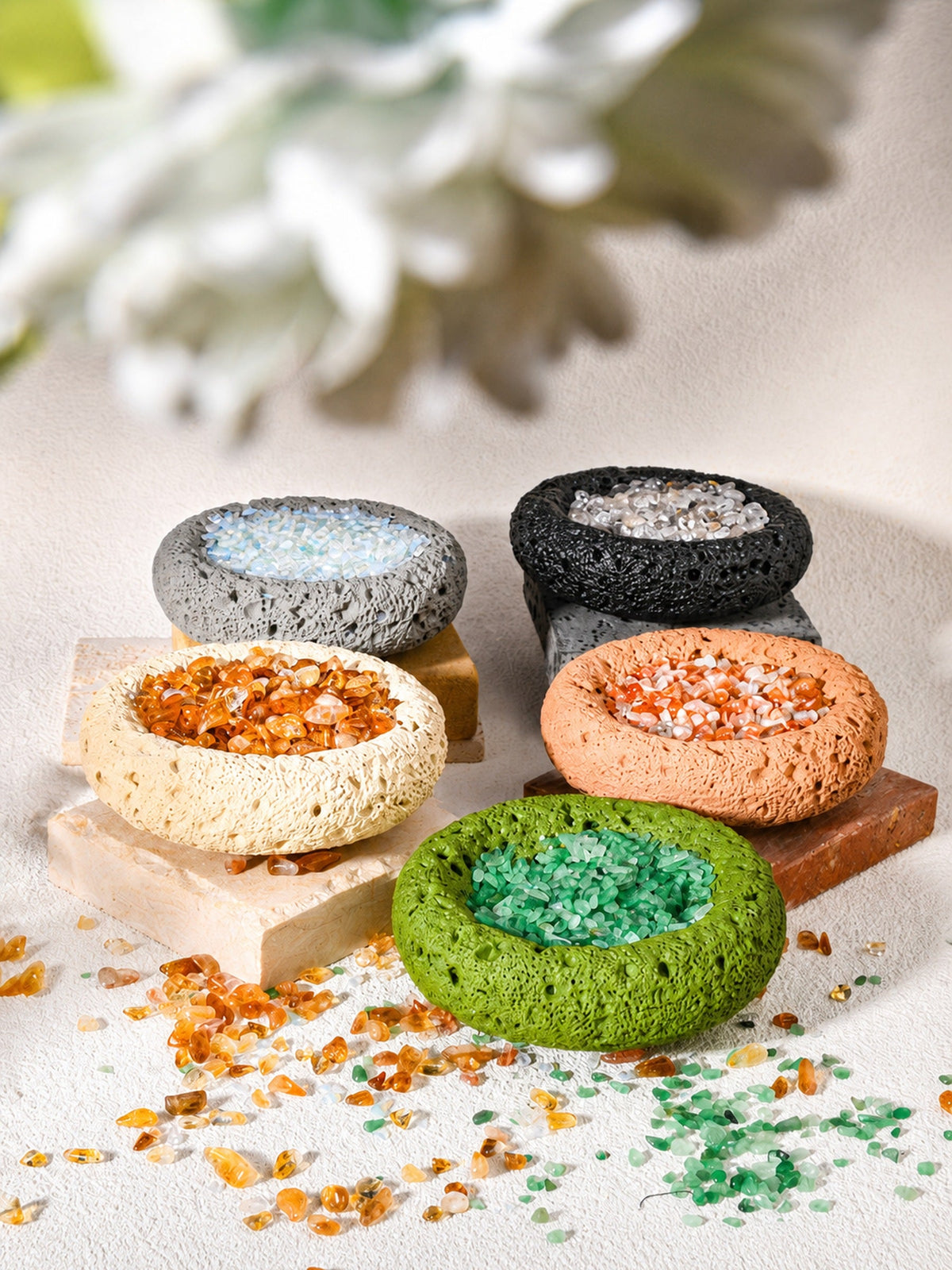 Five traditional crystal cleansing bowls with crystal chips