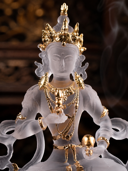 Close view of gilded liuli Vajrasattva, showing gold-colored crown and jewelry details