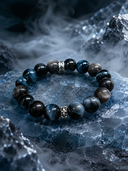 Obsidian and blue tiger’s eye bracelet displayed on ice