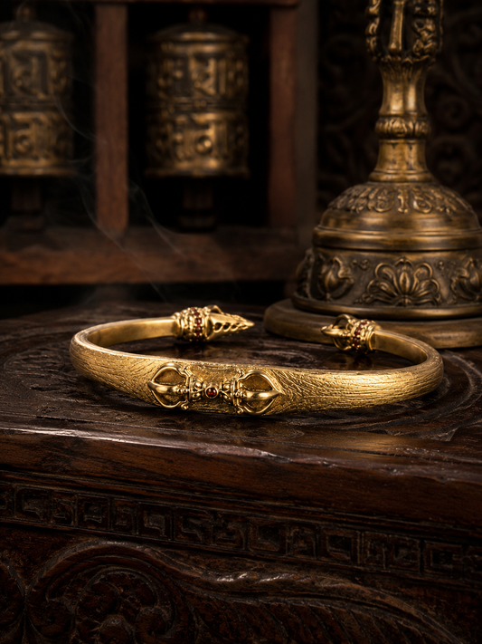 Tibetan Vajra Guardian Bangle — gold-tone main view