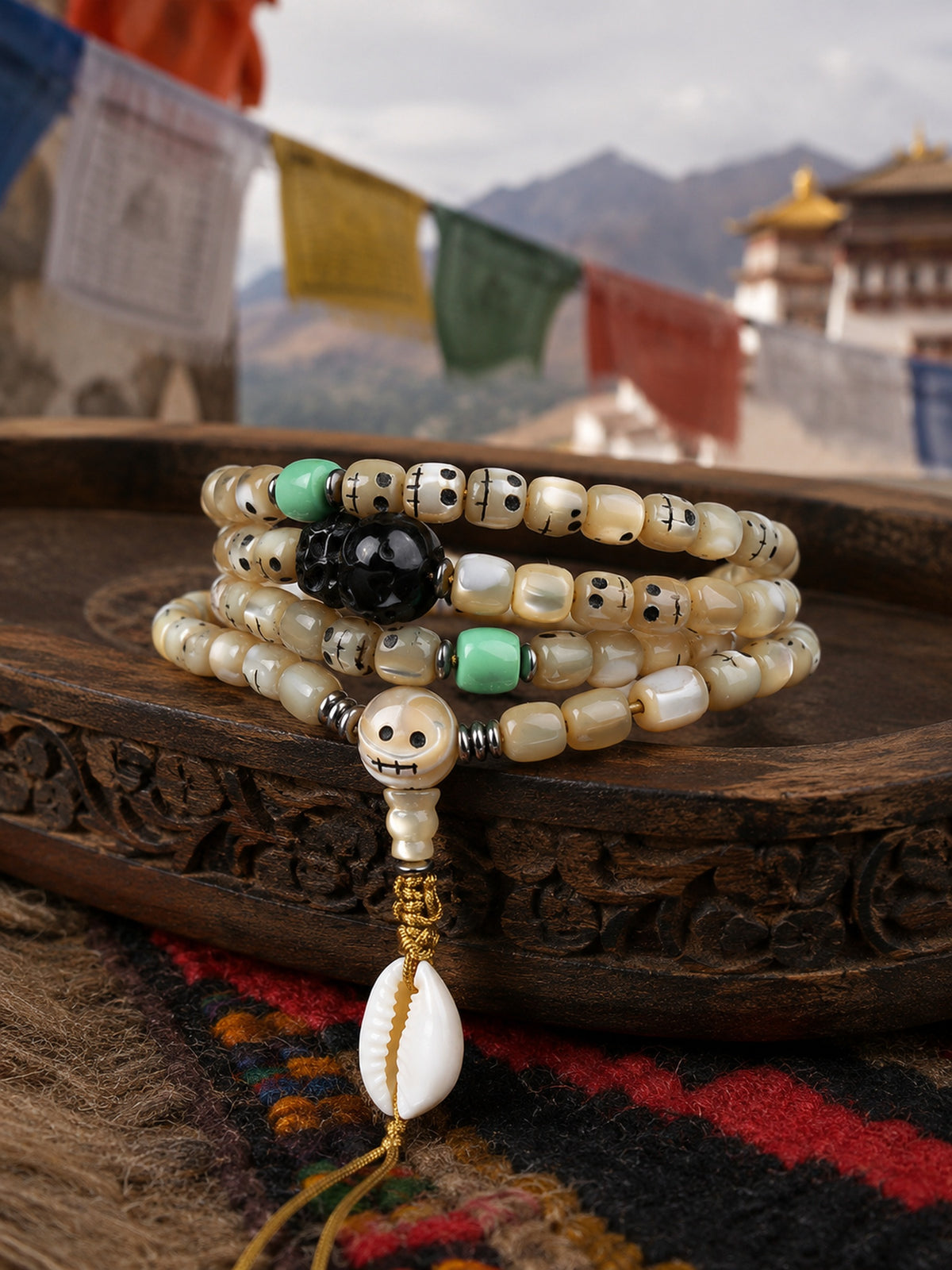 108-Bead Fish Bone Mala with Carved Skull and Shell Accents — main view