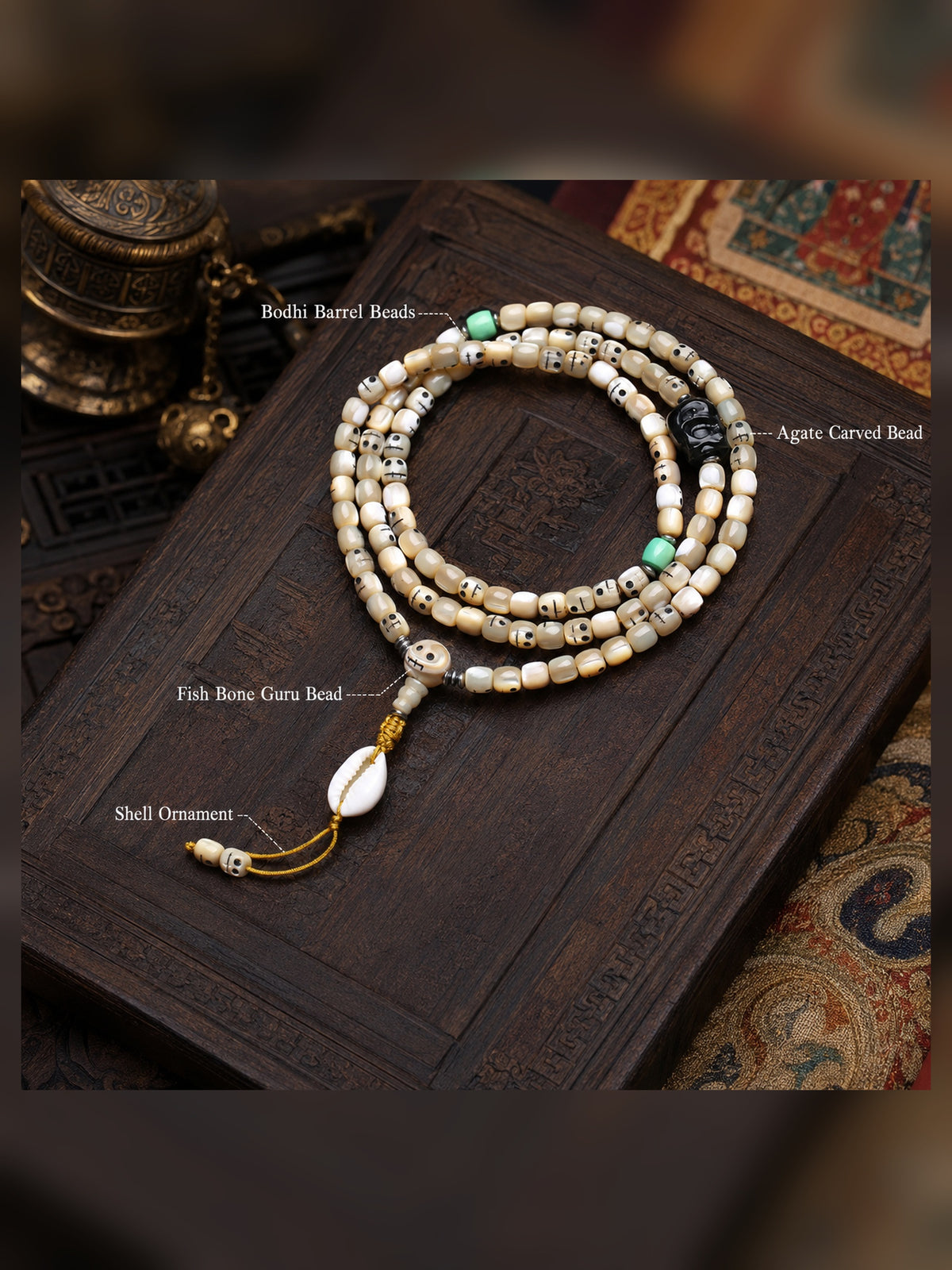 108-Bead Fish Bone Mala with Carved Skull and Shell Accents — detail view 3