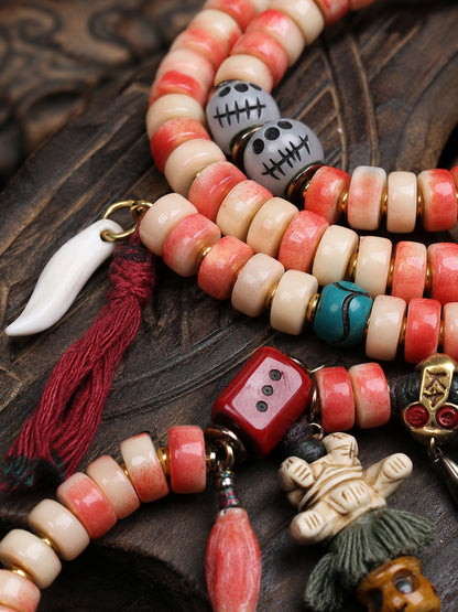 108-Bead Two-Tone Camel Bone Mala with Buddha Hand and Disc Accents — detail view 1