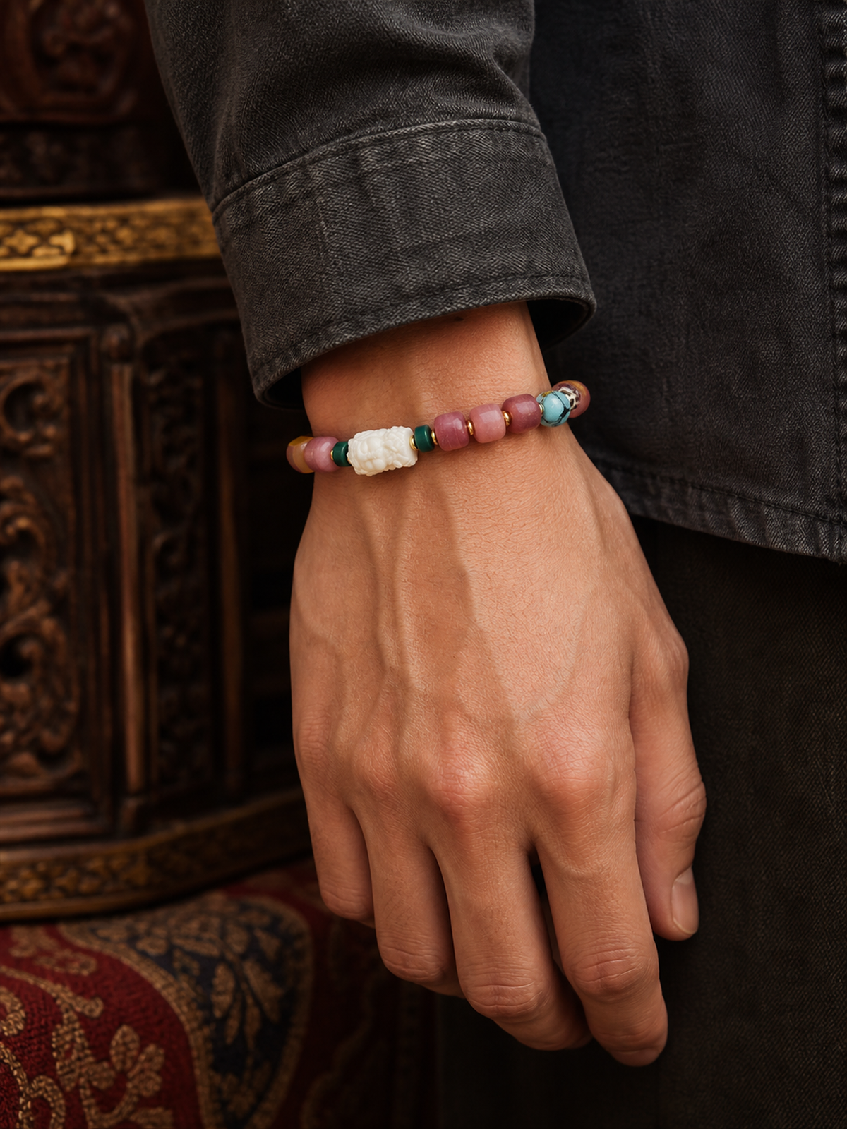 Tibetan Rose-Toned Bone Mala Bracelet with Tara Charm — worn on wrist
