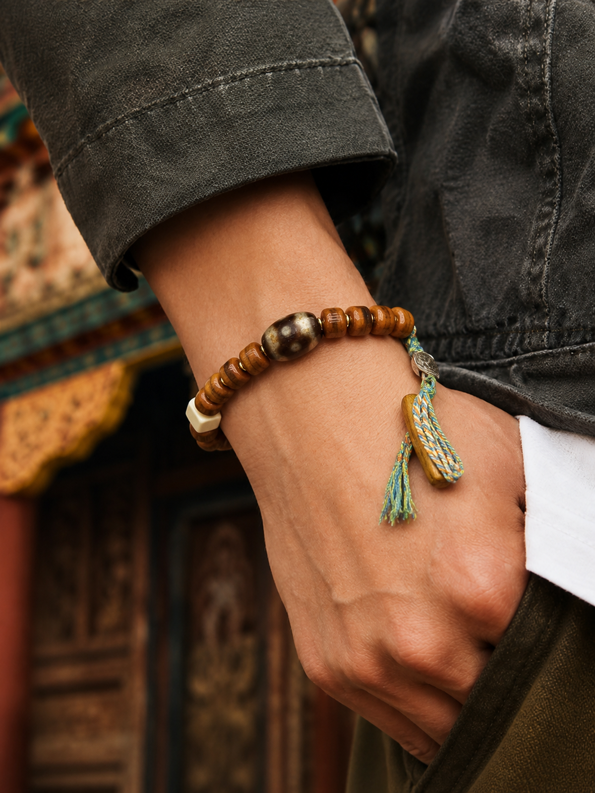 Tibetan Yak Bone Mala Bracelet with Tassel — worn on wrist