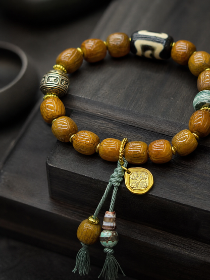 Tibetan Yak Bone Mala Bracelet with Cross Charm — detail view