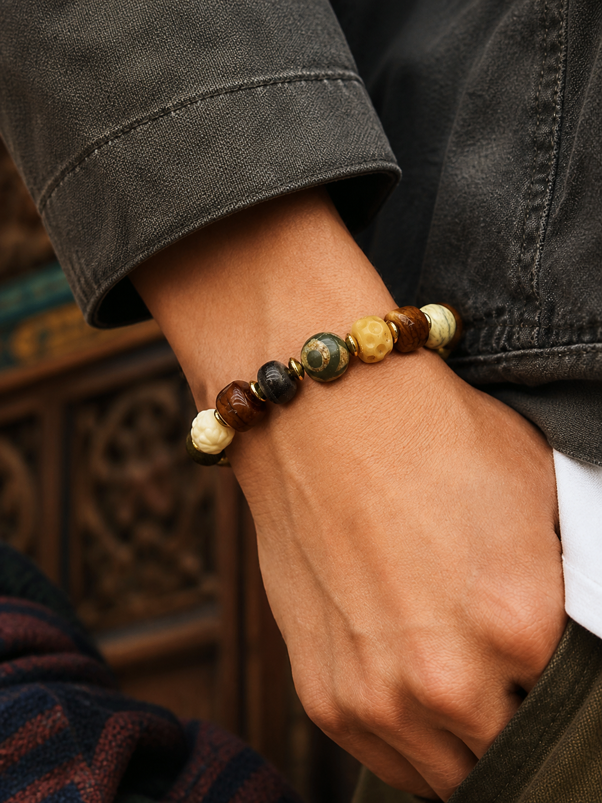 Tibetan Yak Bone Multigem Mala Bracelet with Turquoise-Tone Accents — worn on wrist