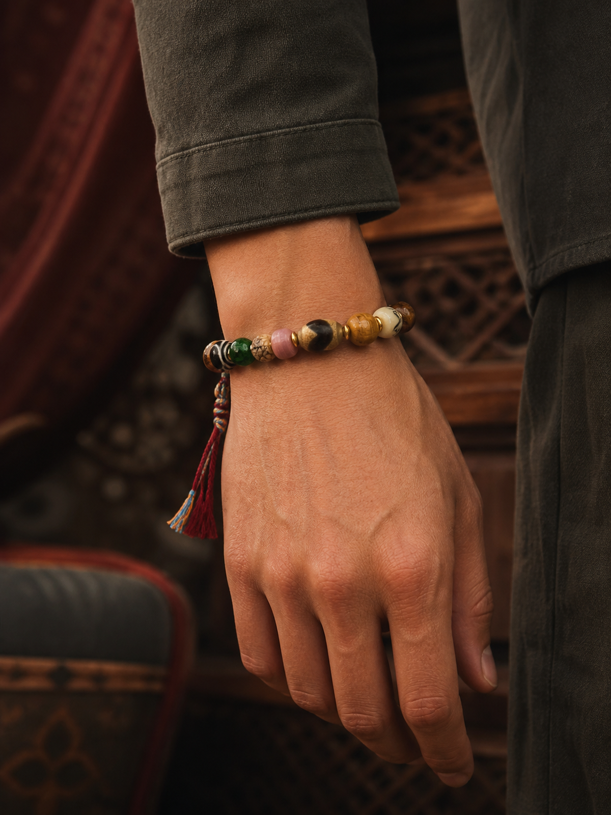 Tibetan Yak Bone Multigem Mala Bracelet with Tassel — worn on wrist