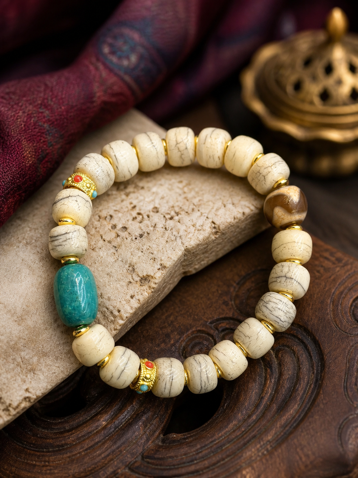 Tibetan Bone Mala Bracelet with Turquoise-Tone Accents — detail view
