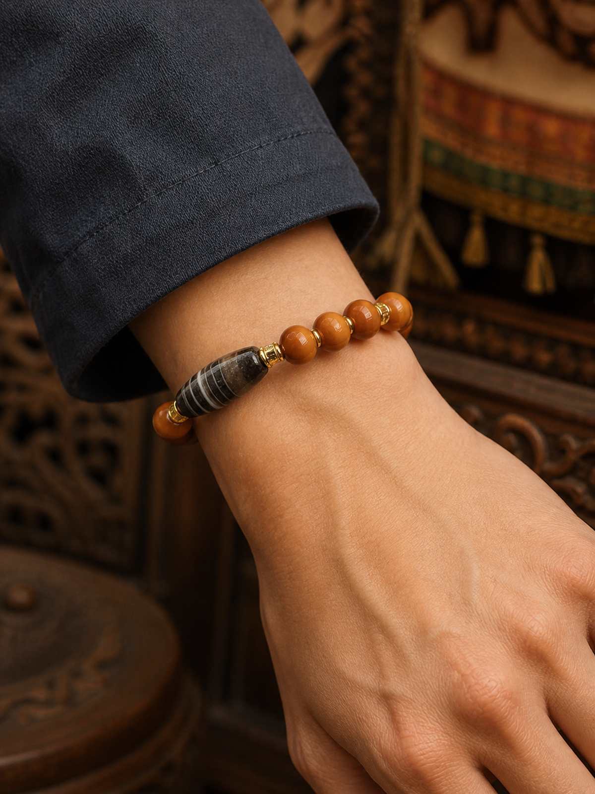 Tibetan Bone Abacus-Bead Mala Bracelet with Dzi-Style Accent — worn on wrist