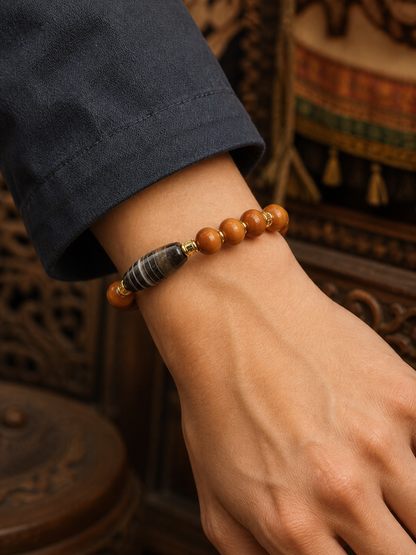 Tibetan Bone Abacus-Bead Mala Bracelet with Dzi-Style Accent — worn on wrist