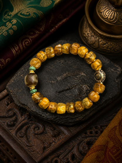 Tibetan Bone Mala Bracelet with Auspicious Motif Bead — main view
