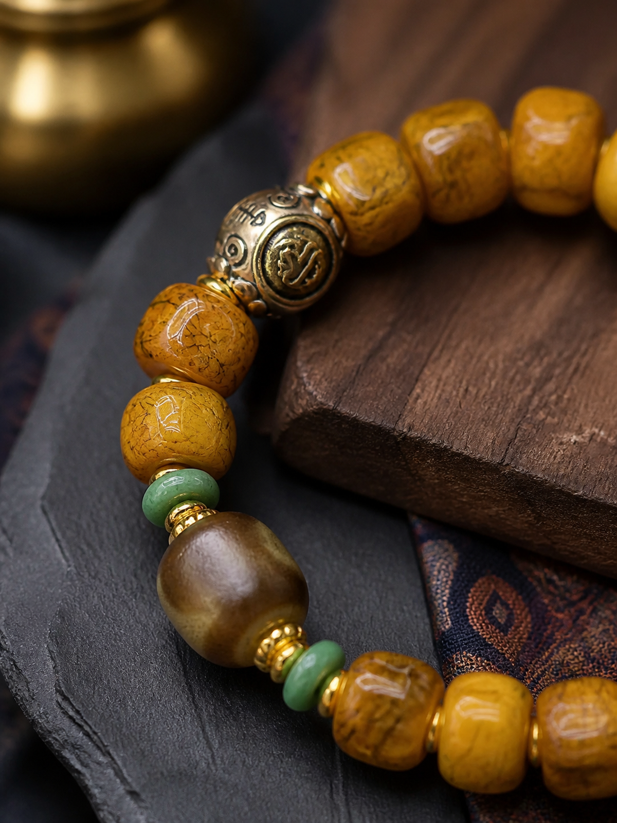Tibetan Bone Mala Bracelet with Auspicious Motif Bead — detail view