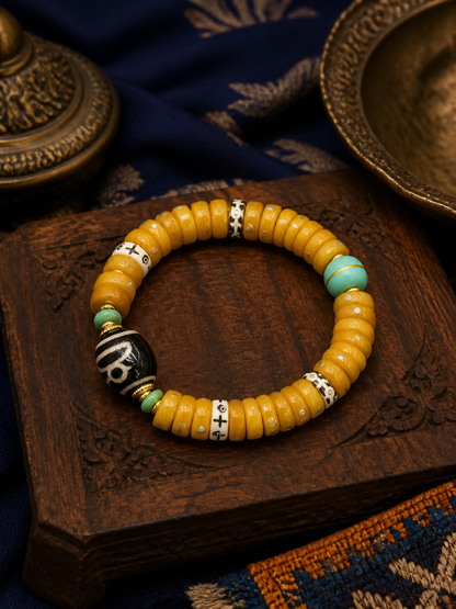 Tibetan Sliced Bone Mala Bracelet with Jambhala Dzi-Style Bead — main view