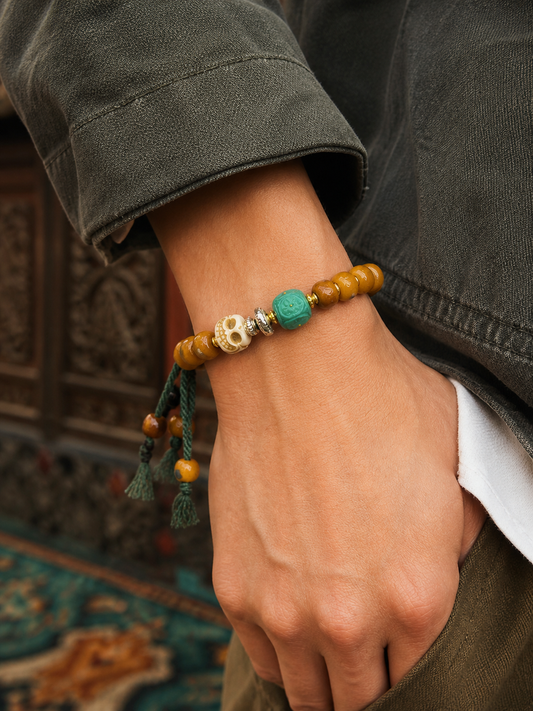 Tibetan Bone Mala Bracelet with Character Bead — worn on wrist