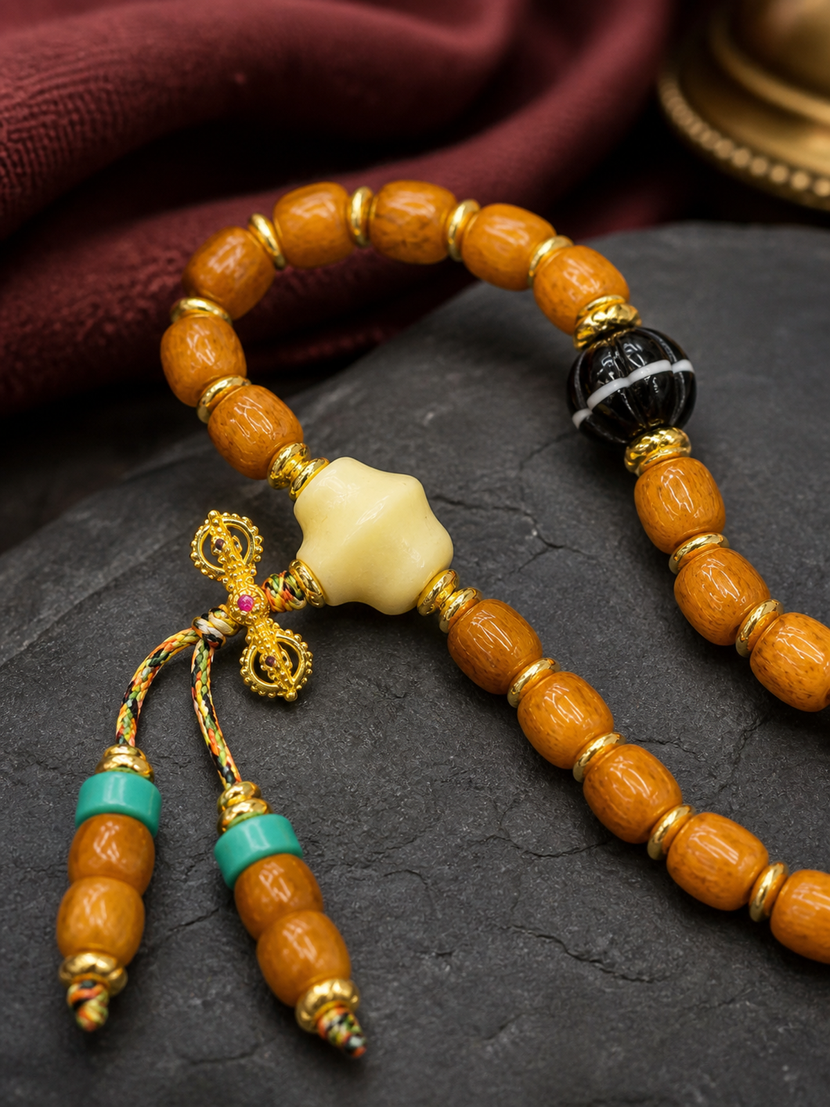 Tibetan Bone Mala Bracelet with Linear Pumpkin Beads — detail view