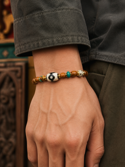 Tibetan Dzi-Style Mala Bracelet with Dice Accent — worn on wrist