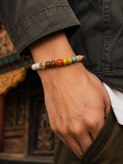 Tibetan Four-Tone Bone Mala Bracelet — worn on wrist