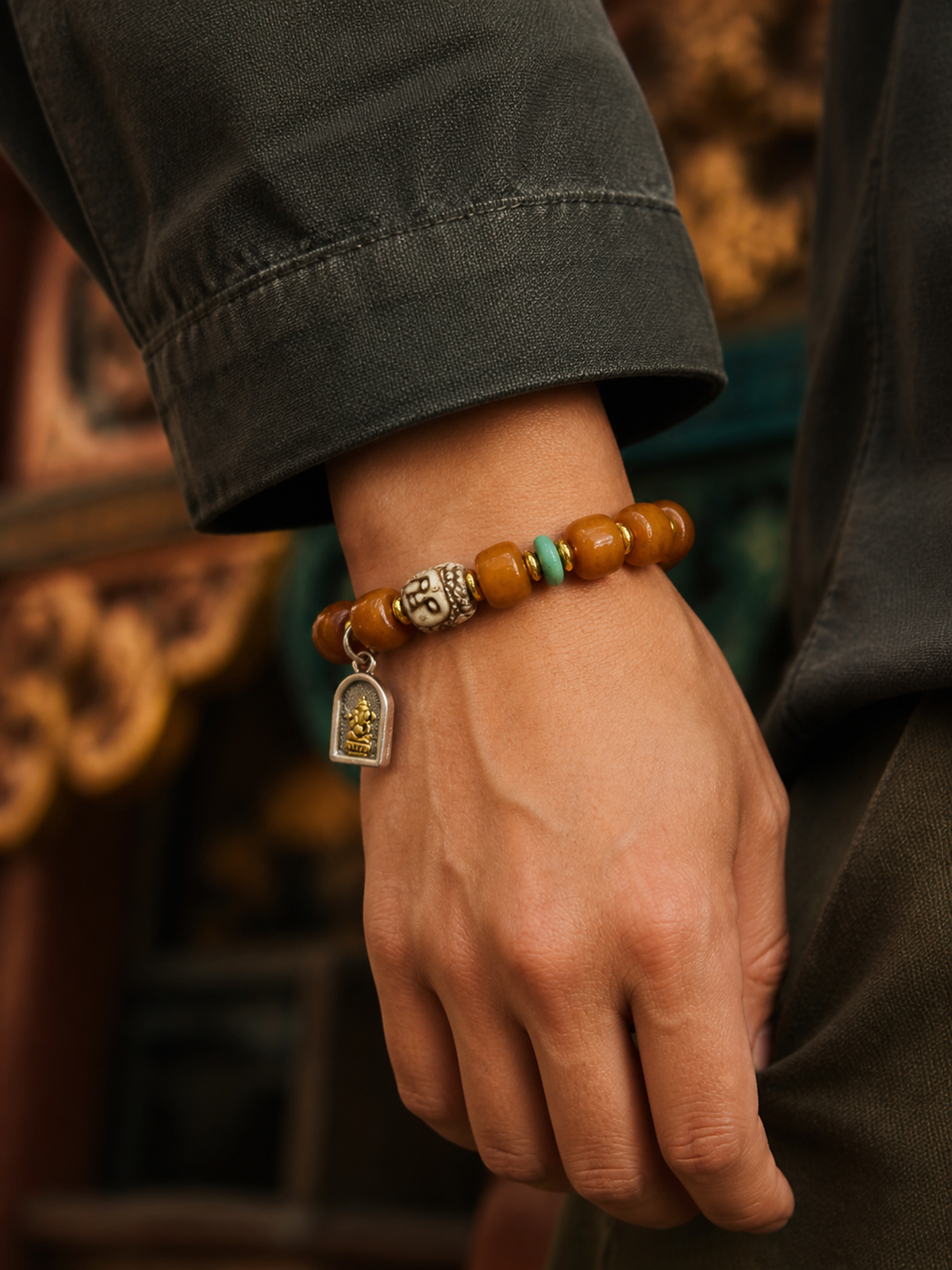 Tibetan Bone Mala Bracelet with Ganesha Motif — worn on wrist