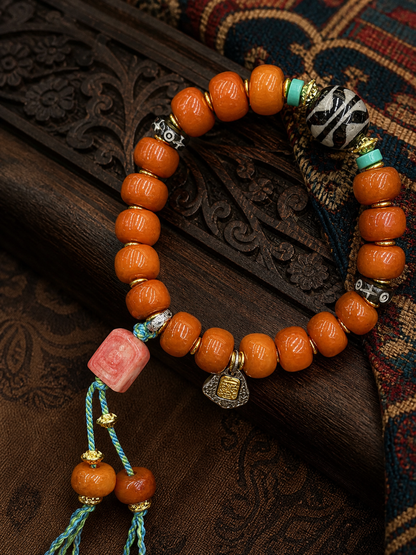Tibetan Caramel-Toned Bone Mala Bracelet with Faceless Buddha Pendant — detail view
