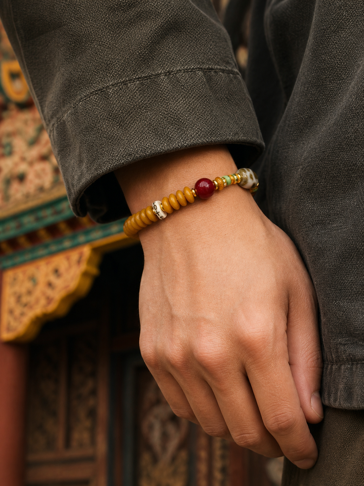 Tibetan Bone Abacus-Bead Mala Bracelet with Auspicious Motif — worn on wrist