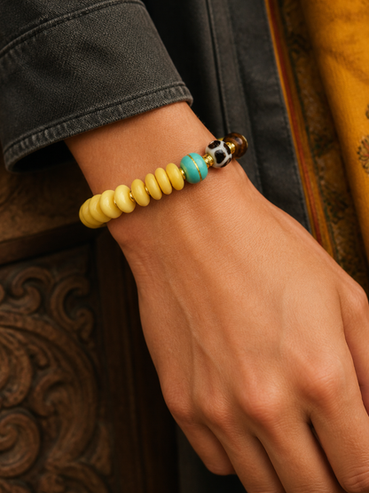 Tibetan Cream-Toned Bone Mala Bracelet with Mountain Tortoise Motif — worn on wrist