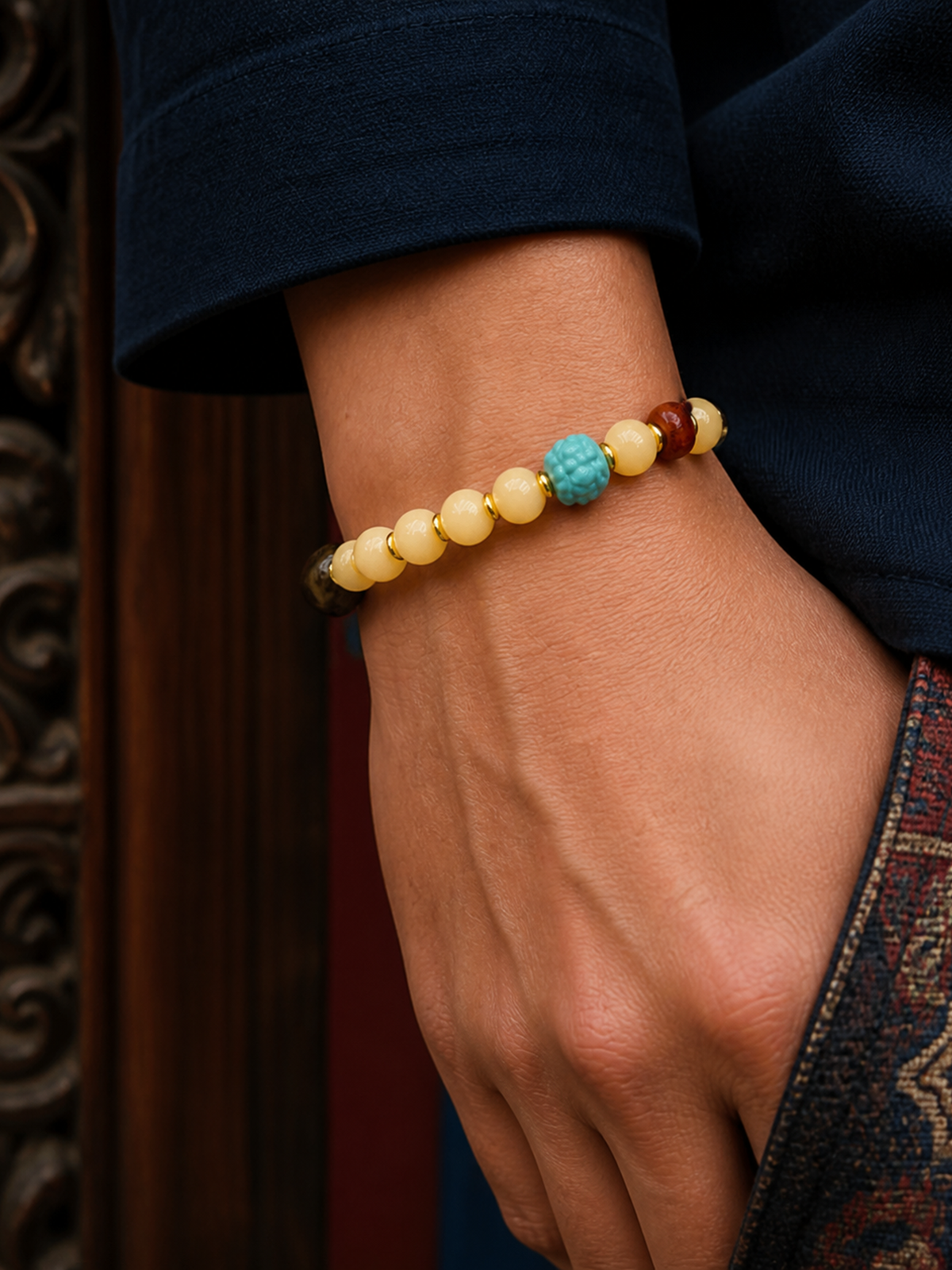 Tibetan Cream-Toned Bone Mala Bracelet with Auspicious Bead — worn on wrist