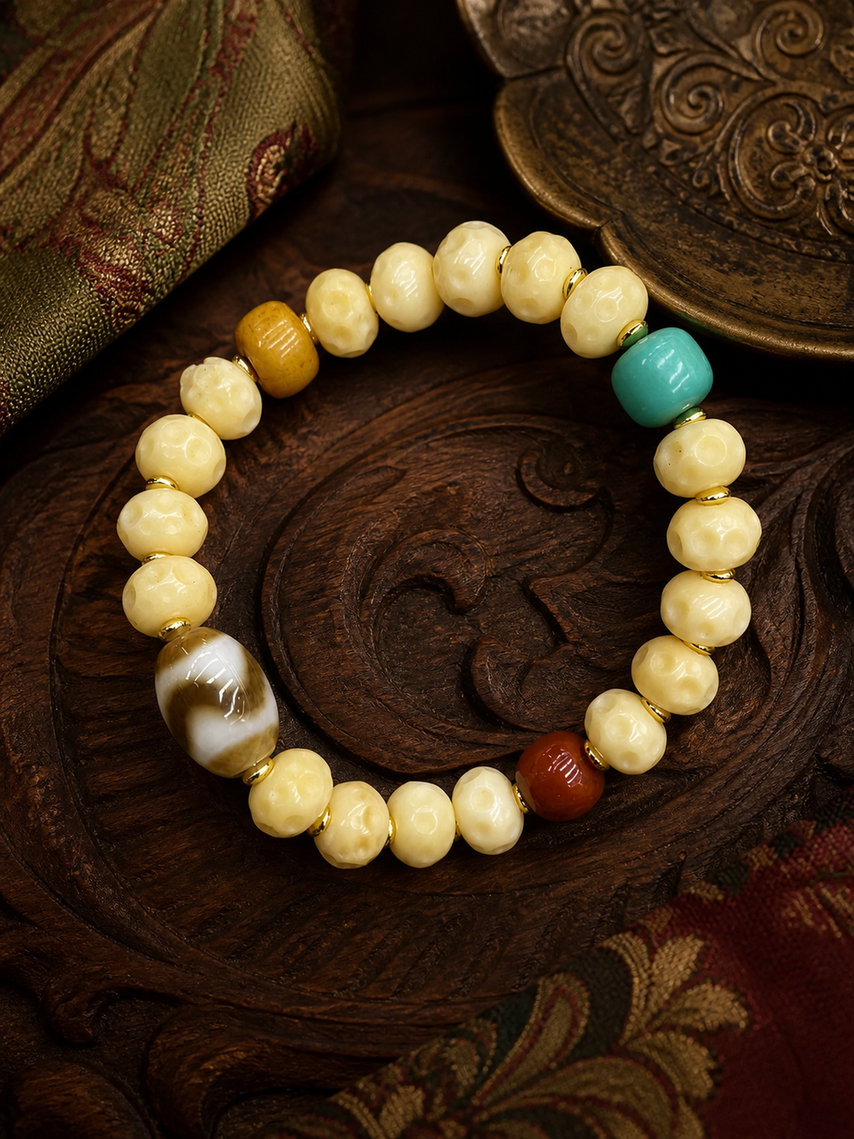Tibetan Cream-Toned Bone Mala Bracelet with Faceless Buddha and Tiger-Tooth Beads — main view