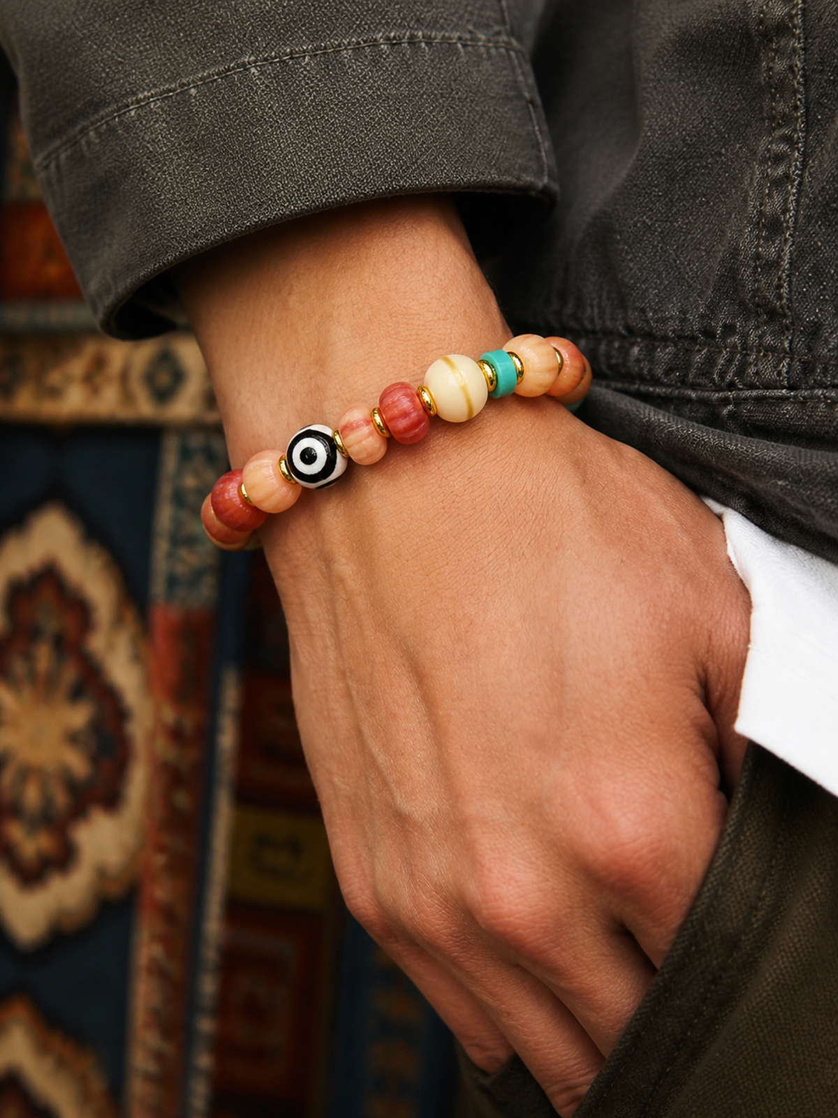 Tibetan Rose-Toned Bone Mala Bracelet with Pumpkin Beads — worn on wrist