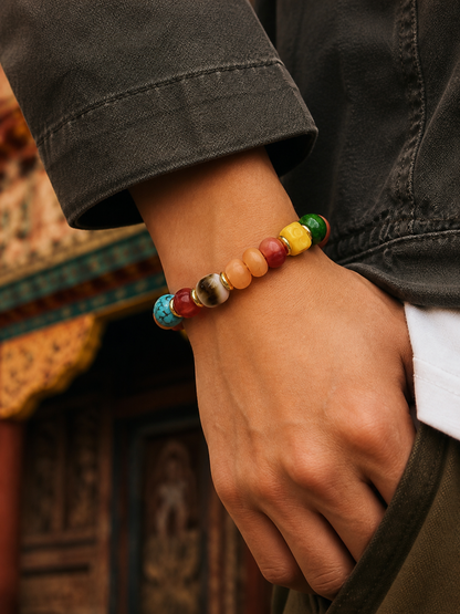 Tibetan Rose-Toned Bone Mala Bracelet with Curved Accent — worn on wrist