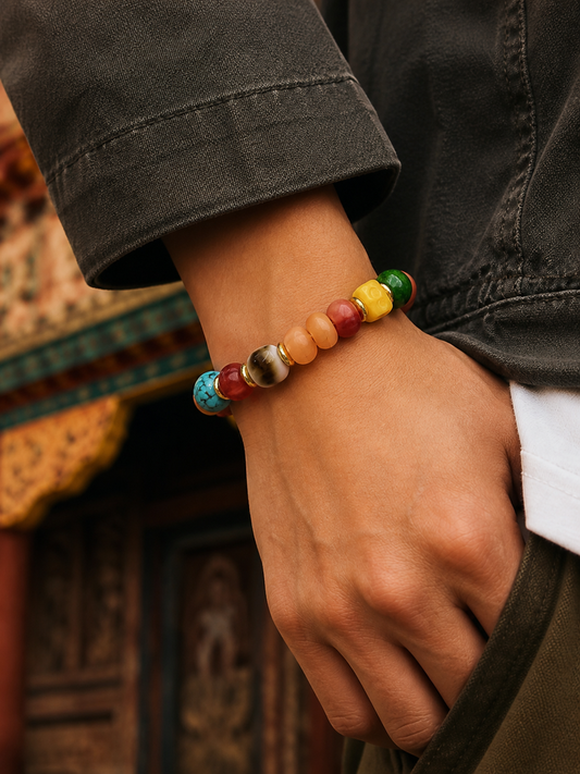 Tibetan Rose-Toned Bone Mala Bracelet with Curved Accent — worn on wrist