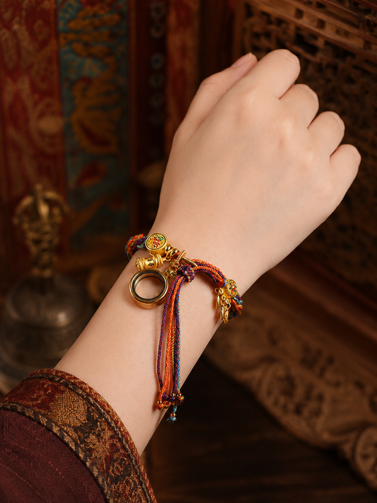 Tibetan prayer wheel dreamcatcher bracelet worn on wrist