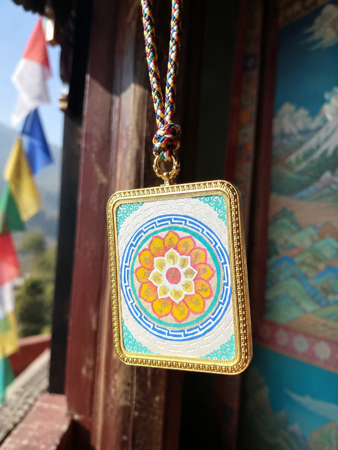 Six-Syllable Mantra pendant hanging beside a painted doorway, showing its turquoise border