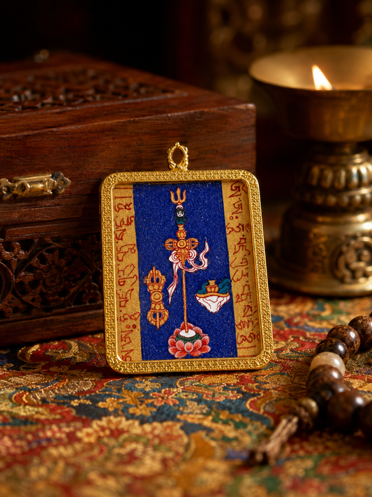 Padmasambhava Heart Mantra pendant with painted symbols on blue and a gold-colored border