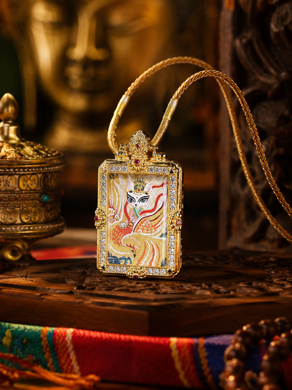 Front view of the Fox Immortal pendant, with the cord looped above its ornamental frame